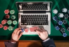 a person playing poker with chips and cards